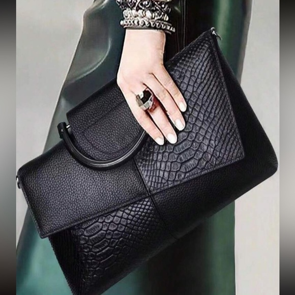 Luce vegan leather clutch